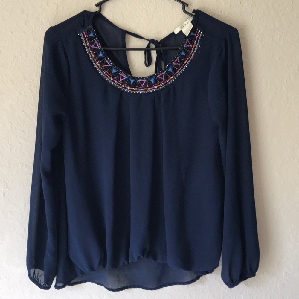 Francesca’s blouse in very good condition